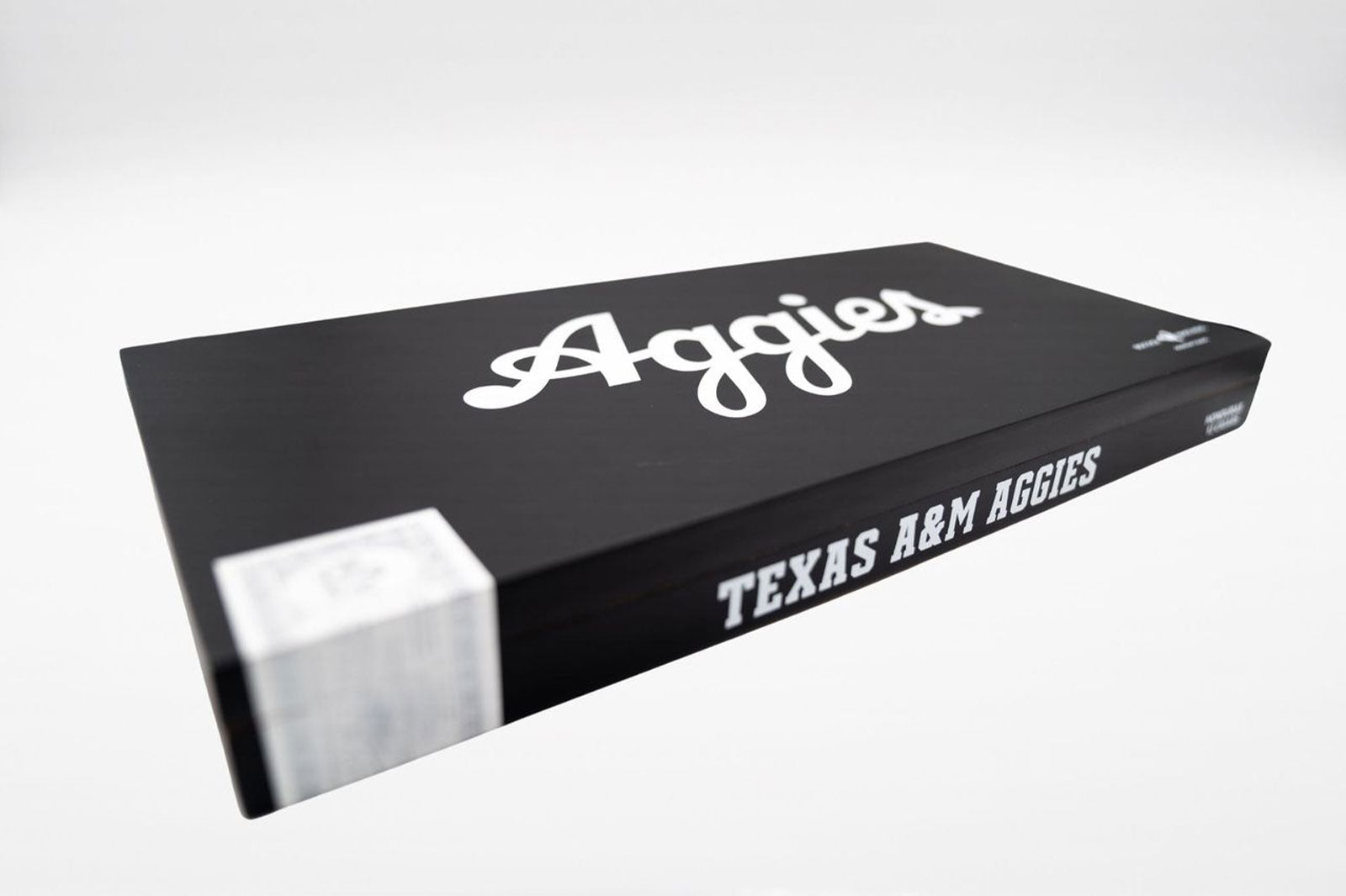Black box with 'Aggies' and 'Texas A&M Aggies' text on a white background